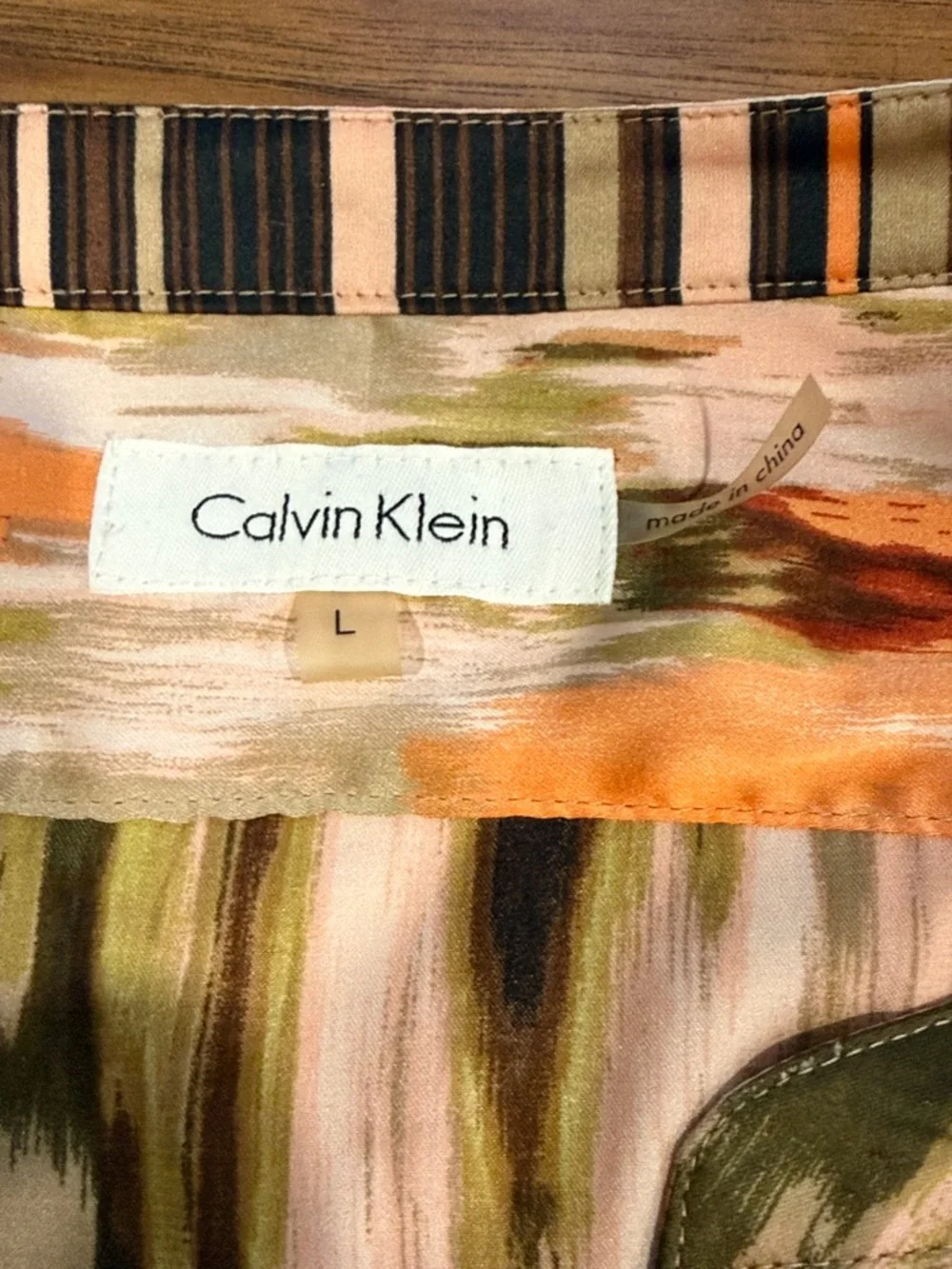 Calvin Klein Multicolored
Abstract Print Tab Sleeve Blouse size L - Picture 6 of 6